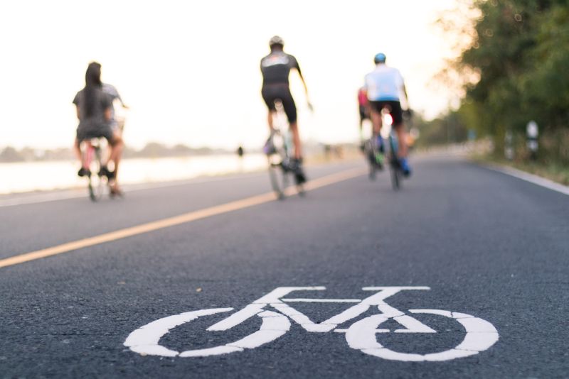 cyclists riding in the bike lane