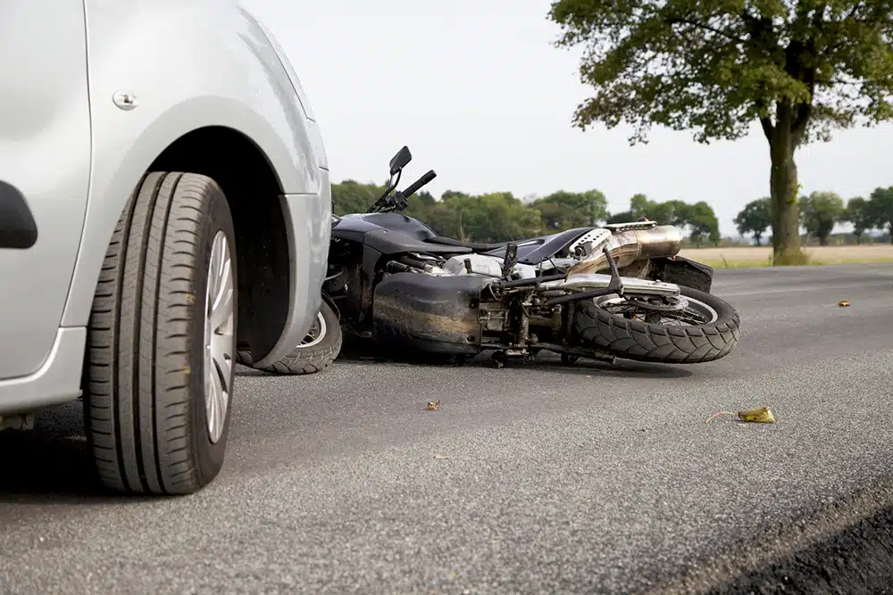 Motorcycle lying on its side after a collision