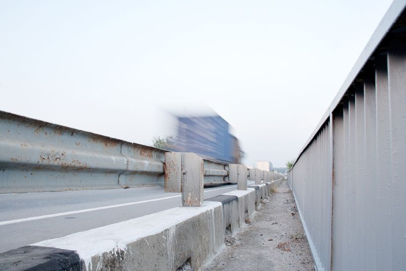 Blurred image of semi trucks in motion